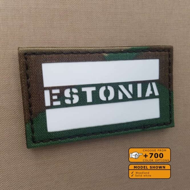 A patch of the Estonia flag with size 2"x3.5" in Woodland background with solid white