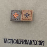 Two patches of the Maltesse Cross with size 1x1 inch: one in Ranger Green with solid orange and the other one in Coyote Brown IR