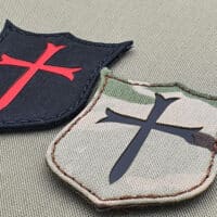 Two patches with the shield of the crussader cross shape. Both with size 3"x2..25", one in Multicam IR and the other one in black background with Red reflective