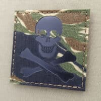 A patch of the Jolly Roger flag with the crossbones, with size 3"x3" in Tiger Stripe camo IR (infrared)