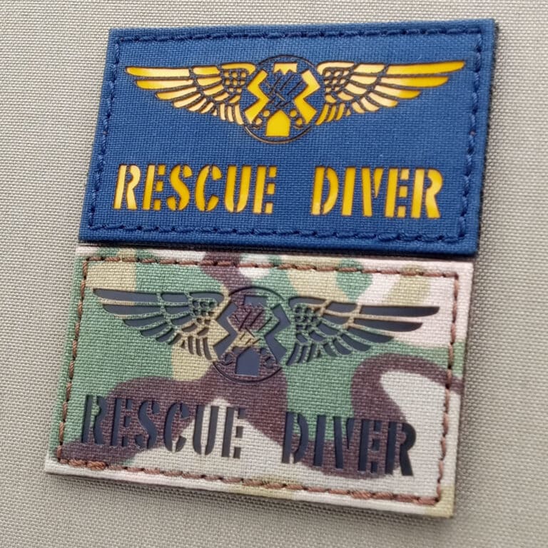 Two lasercut patches of the USCG Coast Guard Rescue Diver Wings with size 2"x3.5": one in Multicam IR and the other one in Navy blue with reflective yellow